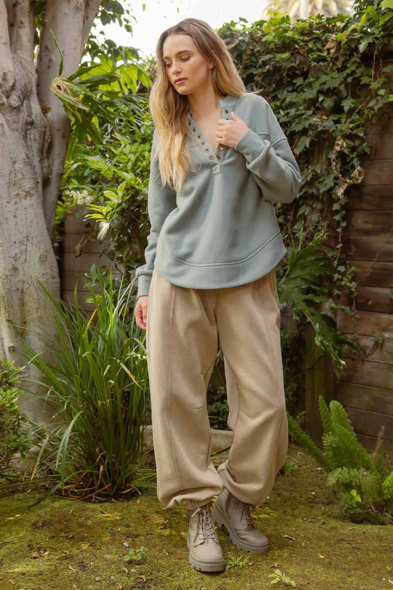 Grommet Knit Top